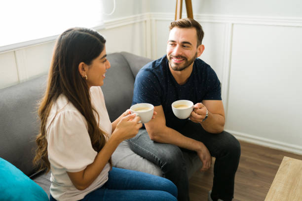 istock Relaxed couple having a talk while relaxing together 1448933897