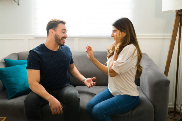 istock Couple looking excited about their pregnancy 1448934317