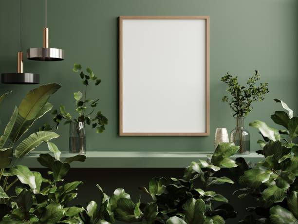 istock Mockup poster frame in minimalist interior background with dark green wall. 1448935396