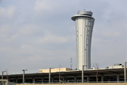Lod, Isr  Nov 29 2022:Air traffic control tower, responsible for the movement of aircraft and vehicles operating on the taxiways and runways of the airport in Ben Gurion Airport, Israel.