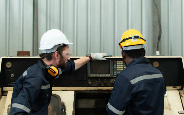 istock Both of engineers are consulting and exchanging repair experience with each other. 1448962606