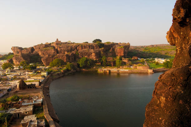 istock Panoramic view of Badami cave temples,sandstone mountains with agasthya lake. 1448965563
