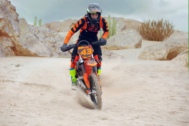 istock Young man practice riding dirt motorcycle 1448967748