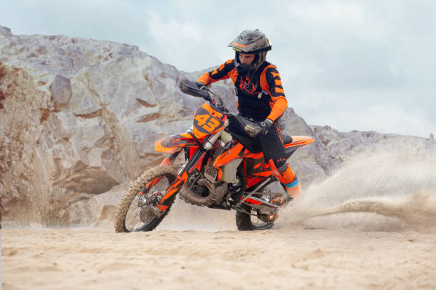 istock Young man practice riding dirt motorcycle 1448967786