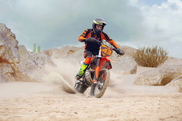 istock Young man practice riding dirt motorcycle 1448967794