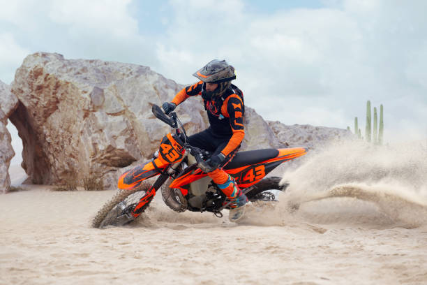 istock Young man practice riding dirt motorcycle 1448967818