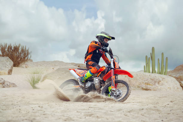 istock Young man practice riding dirt motorcycle 1448967848