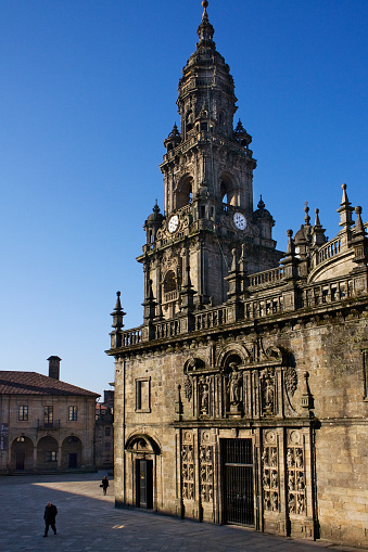 Santiago de Compostela cathedral and Quintana square . Clock bell tower and Holy door. A Coruña province, Galicia, Spain.