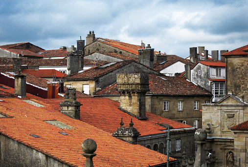View of Santiago de Compostela rooftops and chimneys, old town high angle view seen from cathedral rooftop. Galicia , Spain. Suitable for  backgrounds.