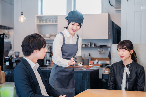istock Young couple on a date at a cafe 1448980995