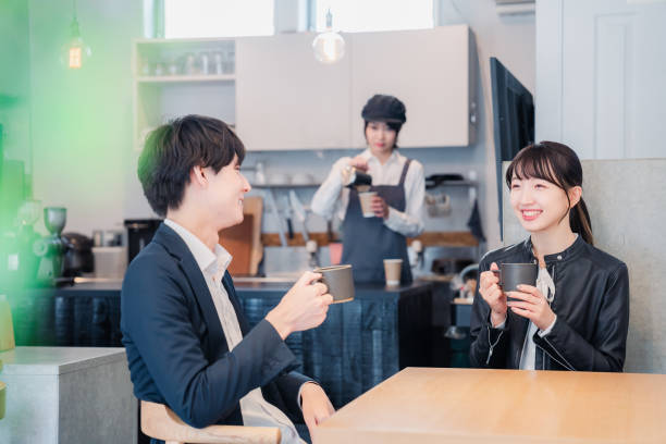 istock Young couple on a date at a cafe 1448981013