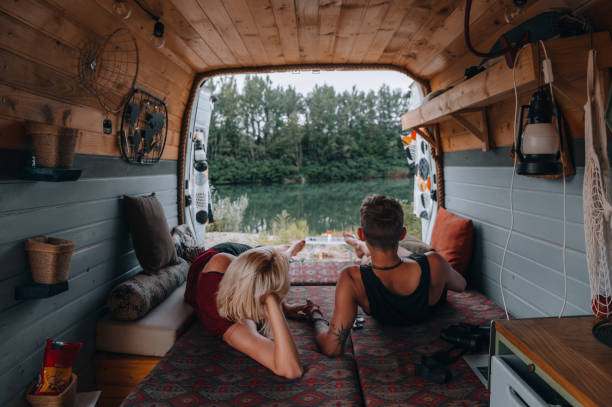 istock Couple enjoying the view from their van 1448981457