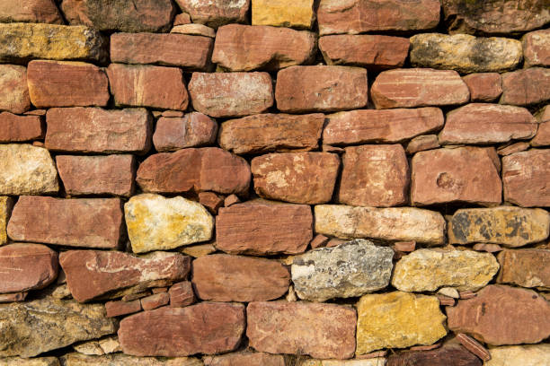 istock Close-up of a dry stone wall as background image 1448983866