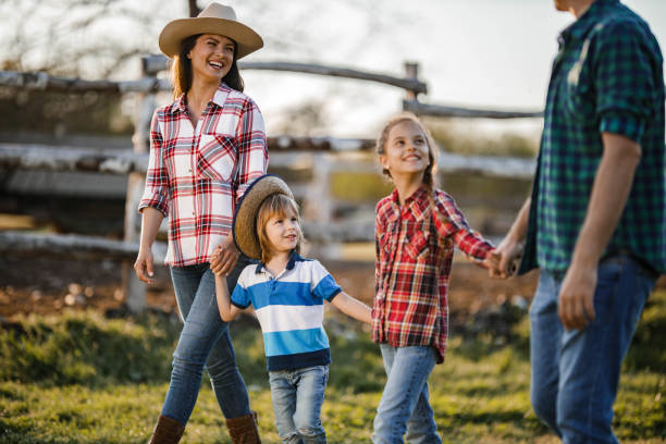istock Happy family enjoying in their walk on a ranch. 1448987768
