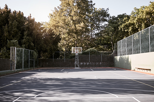 Streetball basketball in a court under the hoop.