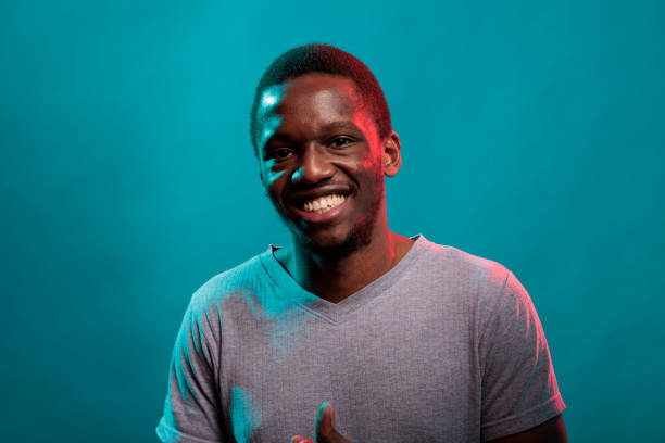 istock Portrait of cheerful man smiling and looking at camera 1448991925