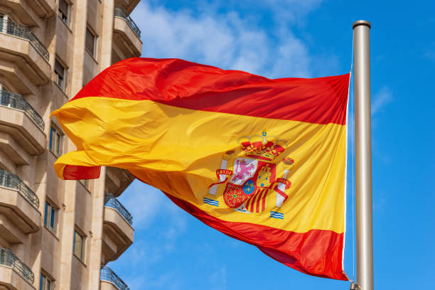 istock Spanish Flag Blowing in the Wind - Plaza de Espana Madrid Spain 1448993317