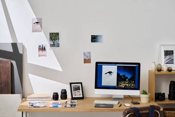 istock Workplace of photographer with computer 1448994268