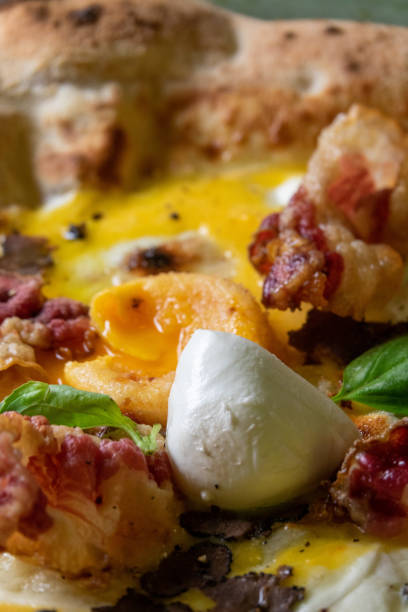 istock Close Up Neapolitan pizza egg and mozzarella 1448995826