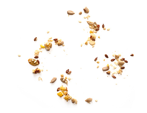 Abstracto cereales dispersos, semillas, muesli, granos sobre fondo blanco, vista superior photo