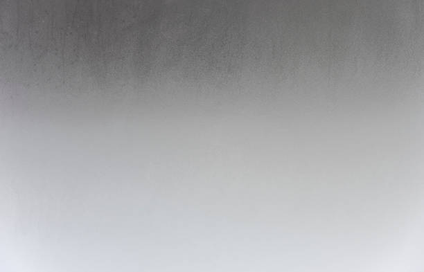 istock Steamy wet glass as texture or background. Humidity on window surface. 1448998085