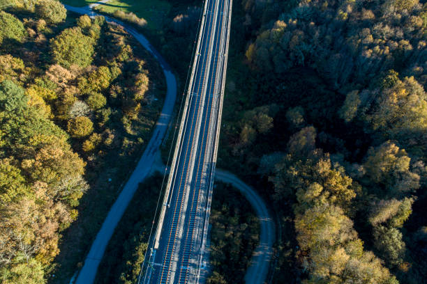 istock aerial view of a high speed railway bridge at sunset 1448999910