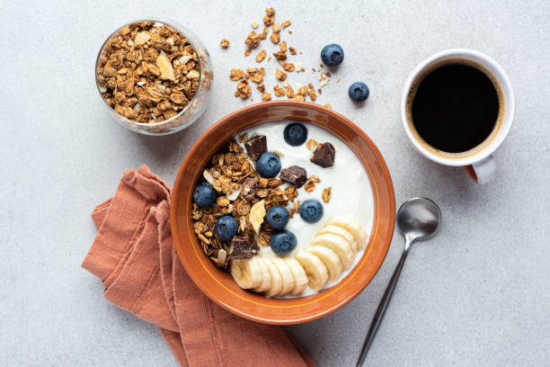 Yogurt with granola, banana, blueberries