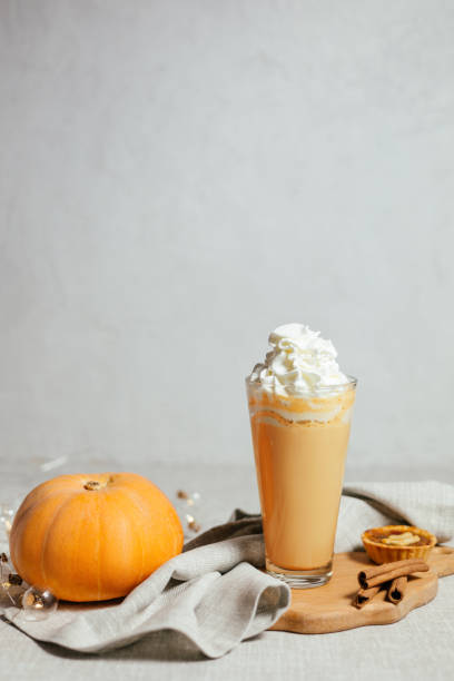 istock Pumpkin spicy latte on a gray background. 1449007613