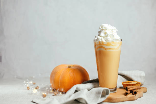 istock Pumpkin spicy latte on a gray background. 1449007621