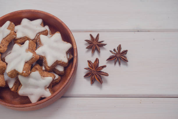 istock Christmas background with Christmas tree branches, candy and Christmas cookies 1449013755