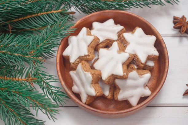 istock Christmas background with Christmas tree branches, candy and Christmas cookies 1449013794