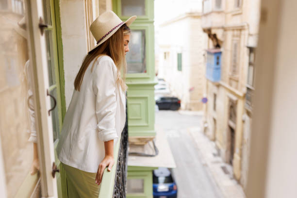 istock Admiring city architecture from terrace 1449013803