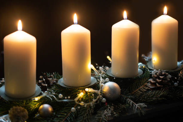 istock Christmas candles, Advent, White candesl and lights 1449015087