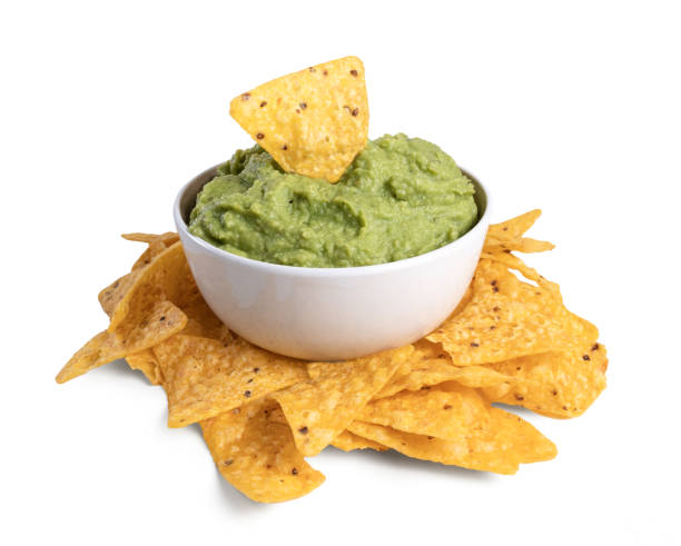istock bowl with guacamole and nachos isolated on the white background 1449015219
