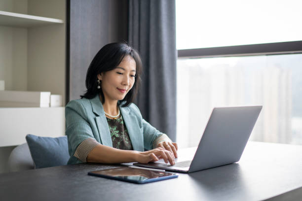 istock An Asian female white-collar worker is in the office 1449018083