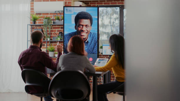 istock Business people using online conference to discuss strategy 1449018456