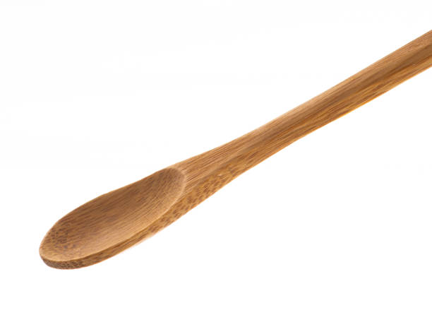 istock Wooden spatula isolated on white background. Studio shot. 1449018542