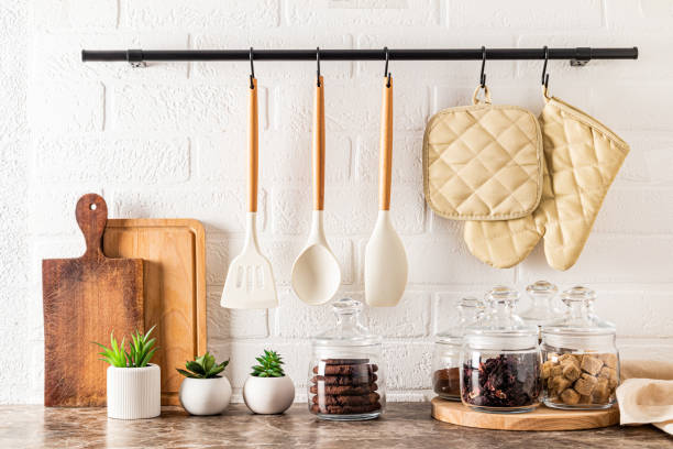 istock beautiful storage area on a modern kitchen countertop. various glass jars with bulk products. wooden boards. kitchen holder, railing 1449019618