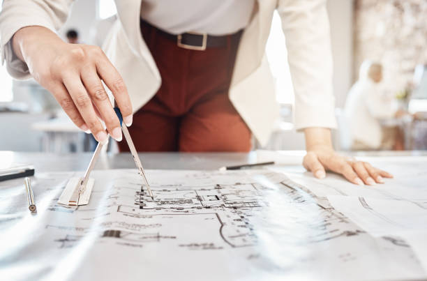 istock Building blueprint, drawing compass of woman planning planning architect or engineer project. Architecture, engineering and industrial designer and worker working on a design model job in a office 1449019918