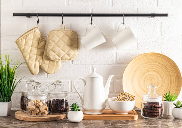 istock beautiful modern interior of ecologically clean kitchen. various kitchen utensils on a marble countertop. front view. kitchen background. 1449020783