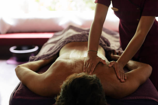 istock Man receiving back massage at health spa 1449020902