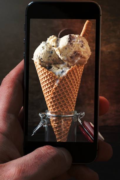 istock Ice cream with cookies in cone photographing 1449021397