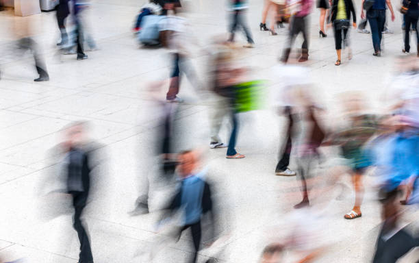 istock People walking in railroad station 1449024278