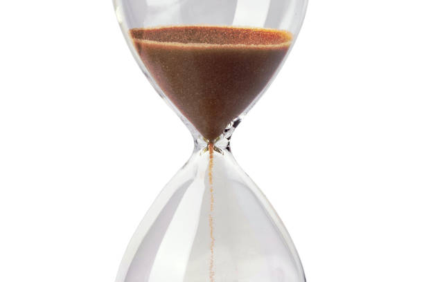 istock glass hourglass with reflection, isolate on a white background 1449027158