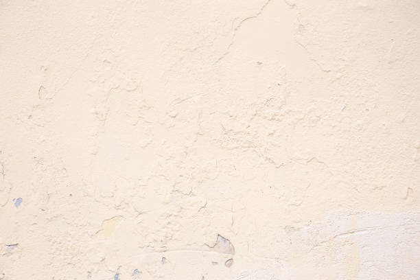 istock Beige background of the plastered wall. Close up. 1449028126