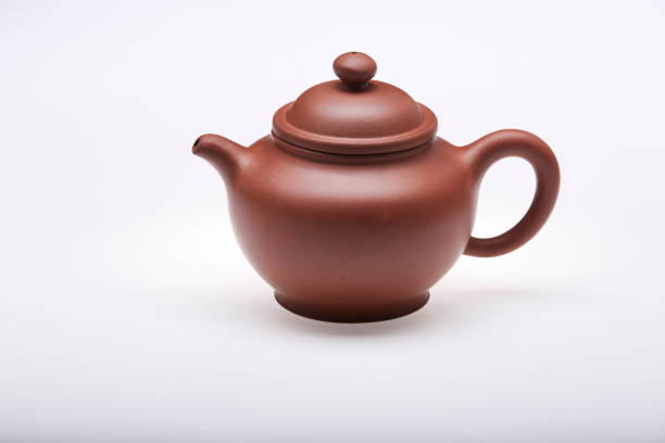 istock Chinese clay teapot isolated on white background. 1449029660