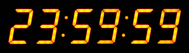 Digital electronic clock shows 23:59:59  before the New Year