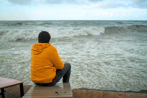 istock A man is worried about extreme weather and climate change 1449031239