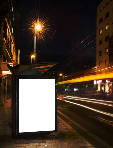 istock Night bus station with blank billboard 1449031532