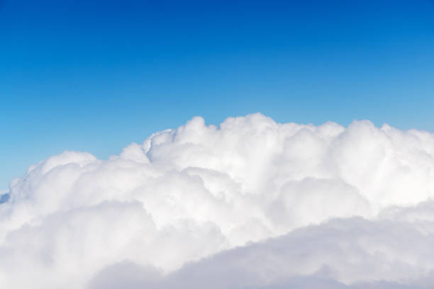istock Sunny clouds and sky from airplane 1449032305
